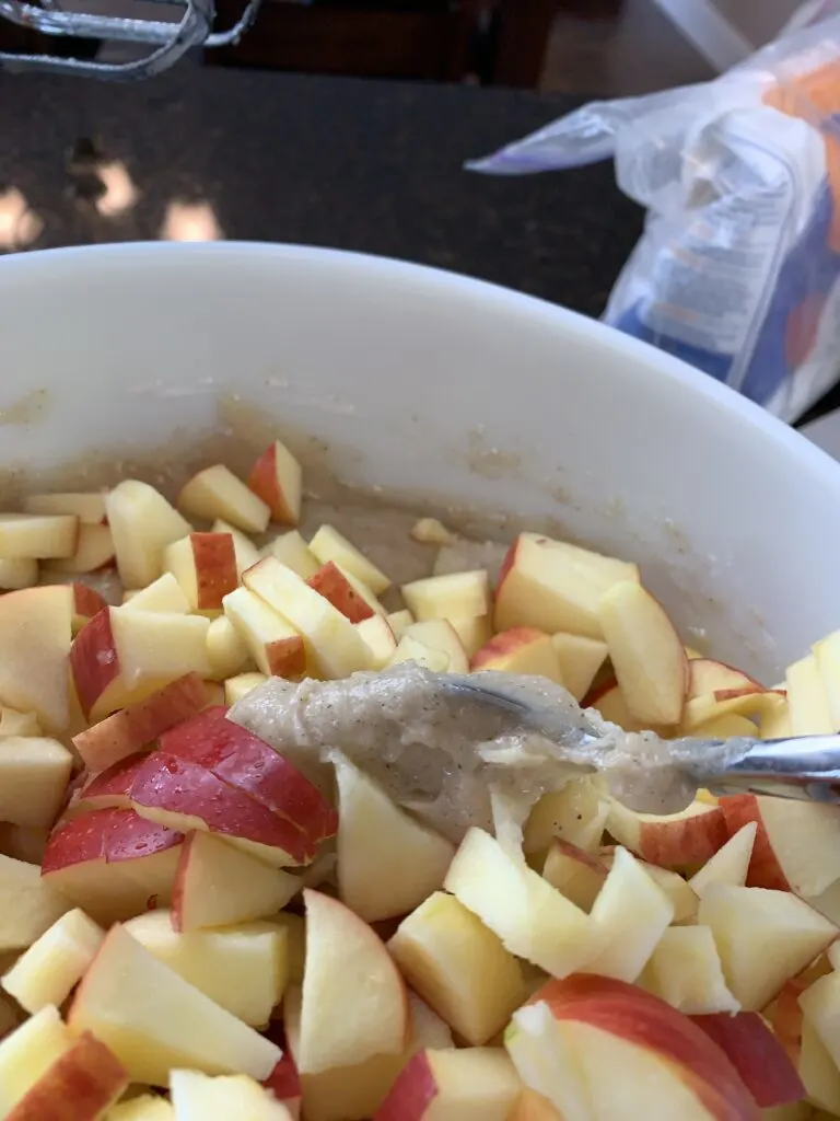 Mixing up an apple cake