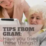 Grandma, granddaughter looking at tablet